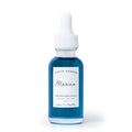 earth harbor marina biome brightening face serum in a travel sized glass dropper bottle
