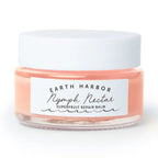 Earth Harbor Nymph Nectar Facial Balm in glass jar with white lid and label on a white background