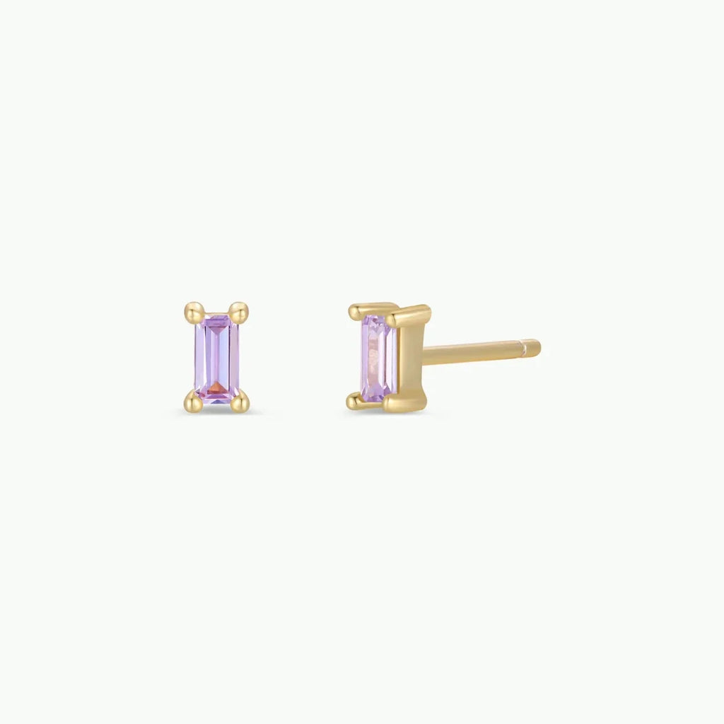 Gold stud earrings with pastel purple baguette stones on a white background