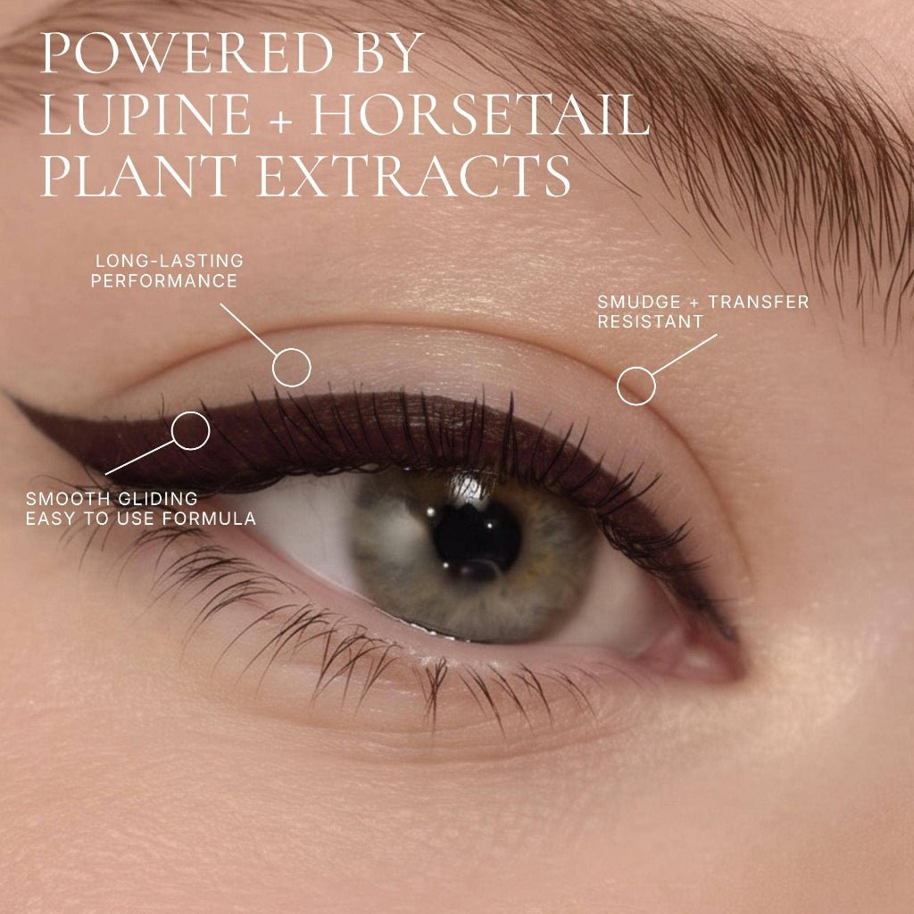 Fitglow Beauty Liquid Eyeliner in black-brown shade with fine felt tip applicator applied with a slight wing to a woman's eye