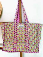 Floral Market Bag, reversible tote with double shoulder straps and large pocket in green, pink and purple floral print.