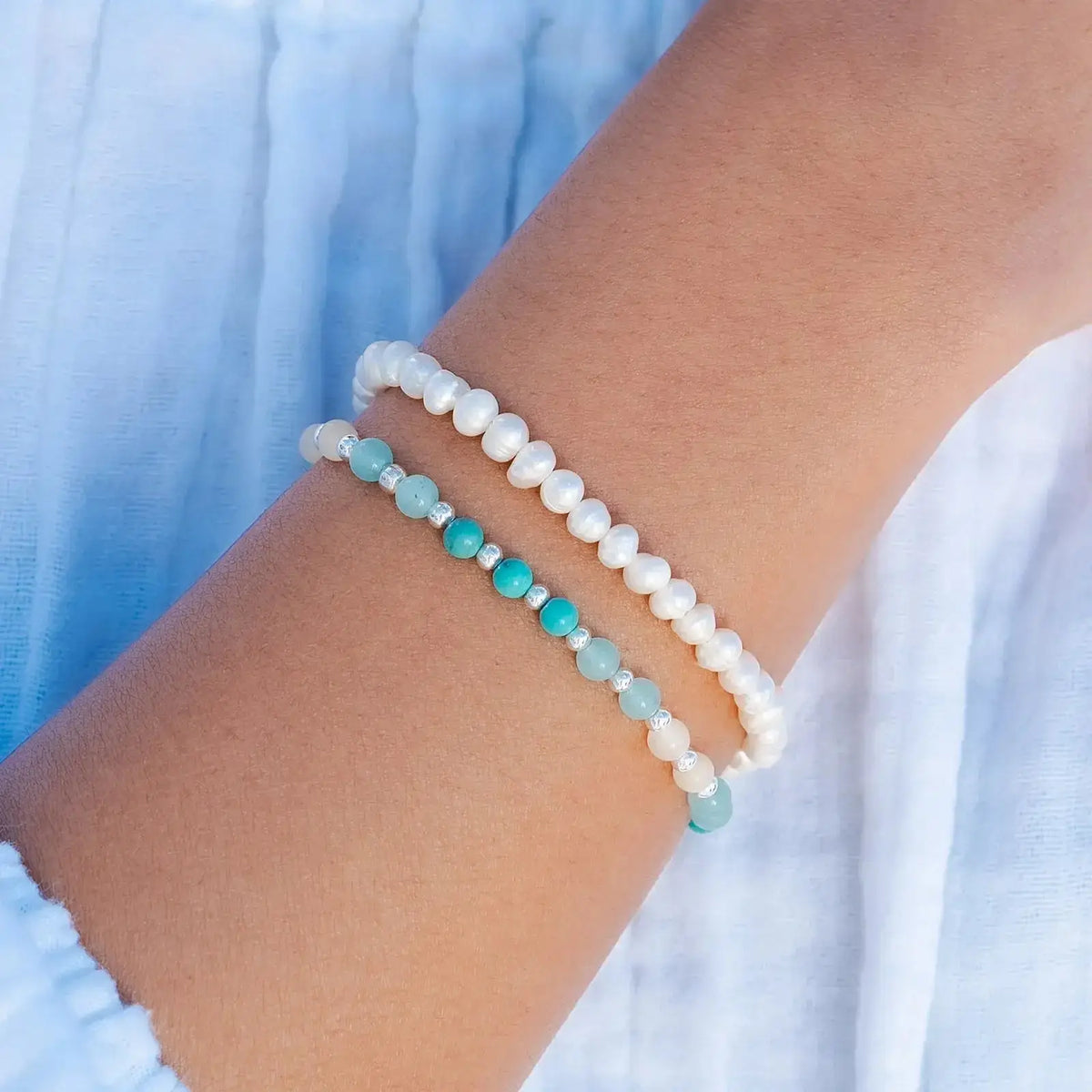 Blue Turquoise & Amazonite gemstone bracelet on a woman's wrist