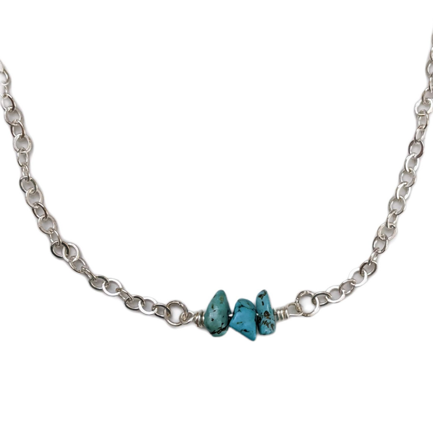 blue turquoise stones on a silver necklace chain