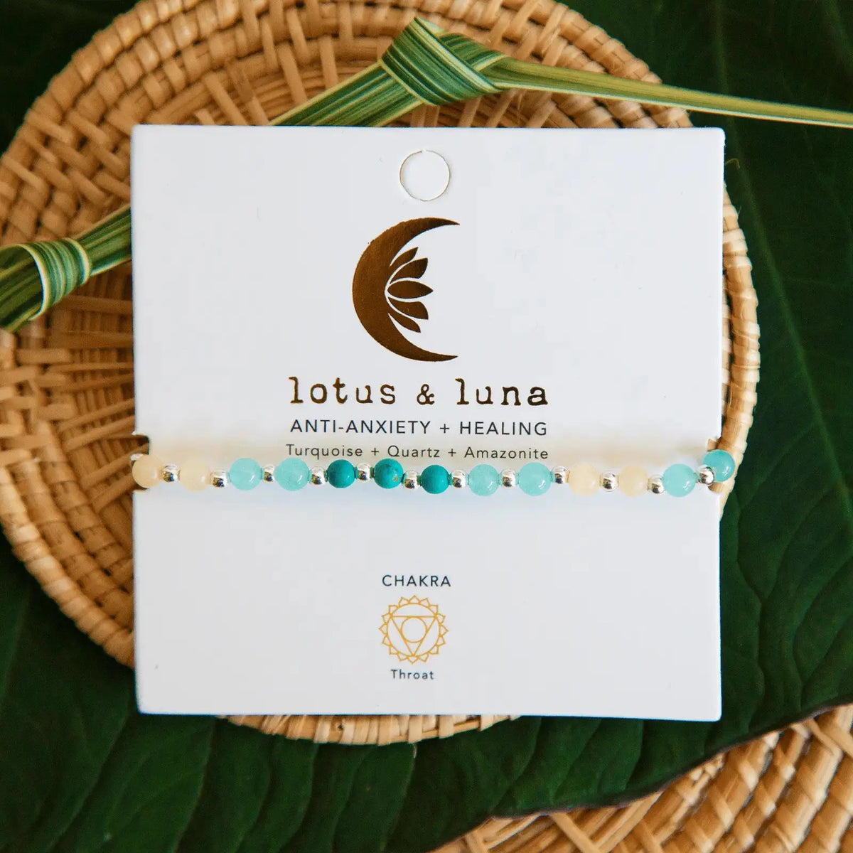A close up of an Blue Turquoise and green Amazonite Gemstone Bracelet by Lotus and Luna.