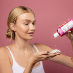 Woman applying Heritage Store Rosewater Toner Mini to cotton pad for glowing skin. Clean Beauty Skincare at Elle and Willow.
