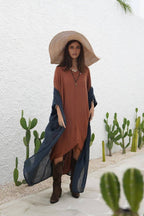 Indigo Blue Long Kimono Duster in lightweight ramie cotton draped over a rust dress, styled with a wide sun hat and boots for a boho-chic look.