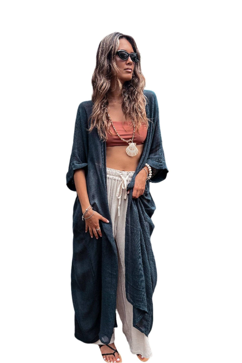 Indigo Blue Long Kimono Duster made from lightweight ramie cotton, styled with a macrame belt and three-quarter sleeves for a boho-chic look.