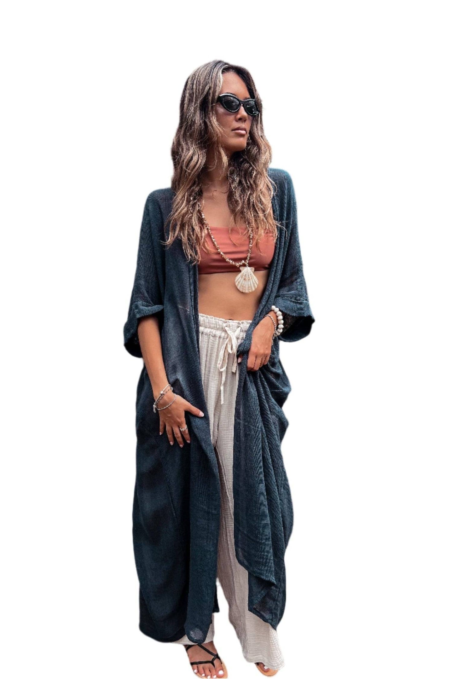 Indigo Blue Long Kimono Duster made from lightweight ramie cotton, styled with a macrame belt and three-quarter sleeves for a boho-chic look.