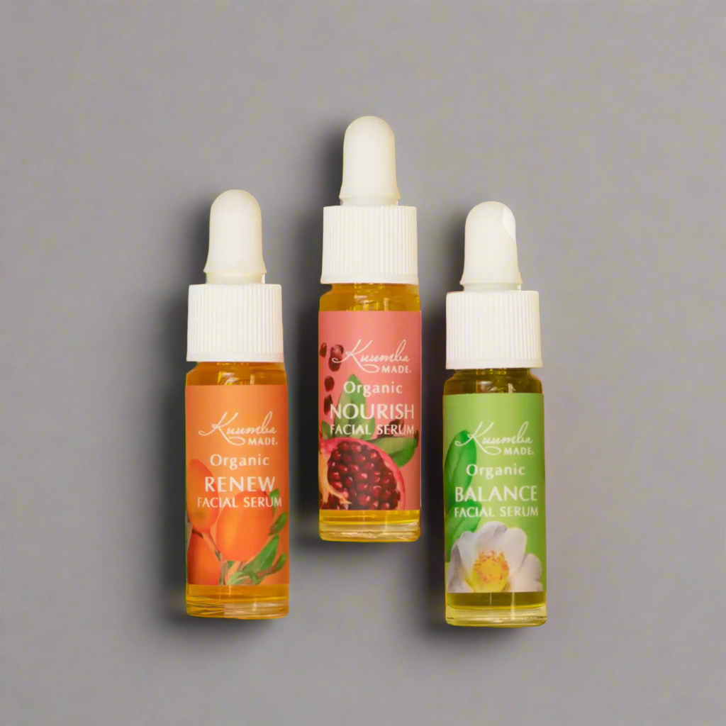 kuumba made facial serums, 3 small serum bottles