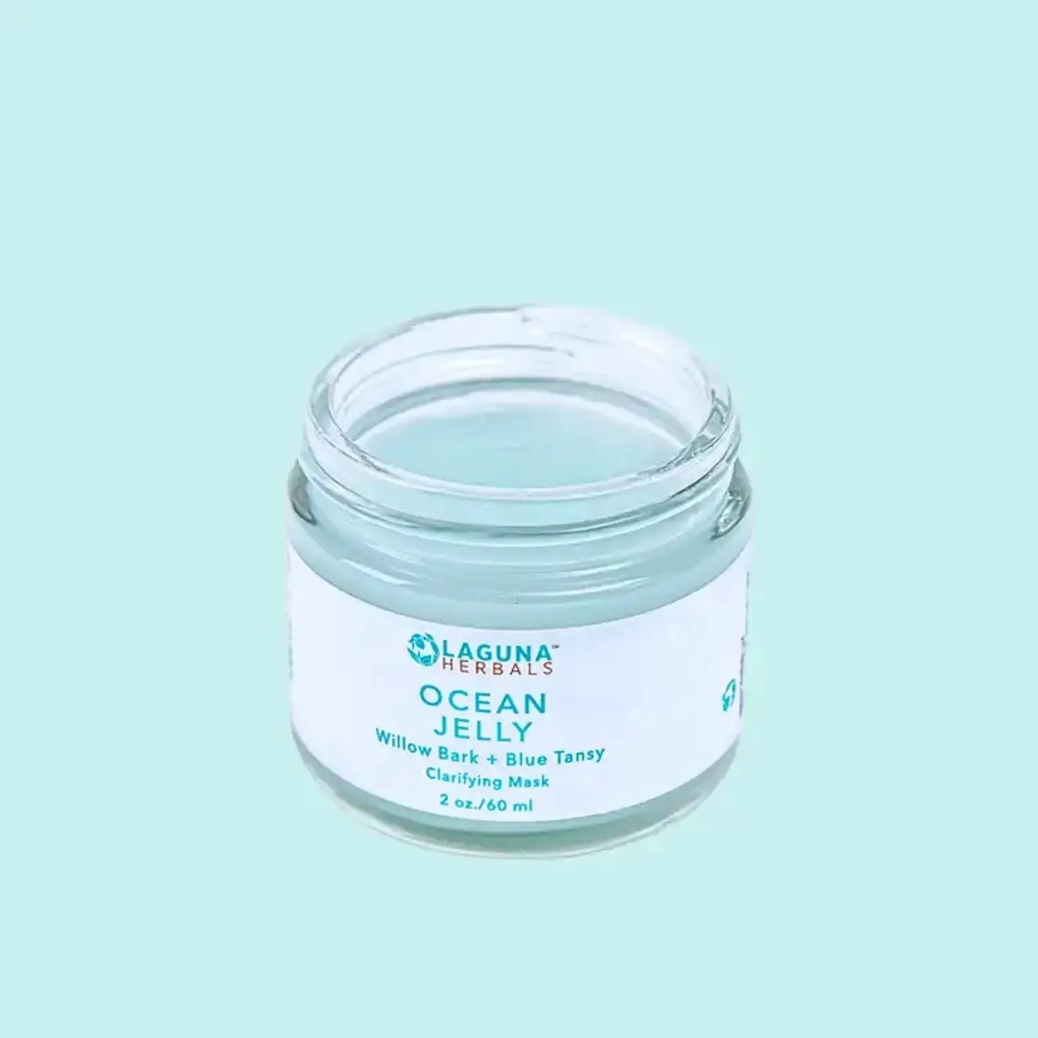 a jar of gel face mask on a blue background