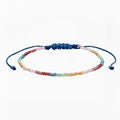 multi colored crystal affirmation goddess bracelet with blue silder cord