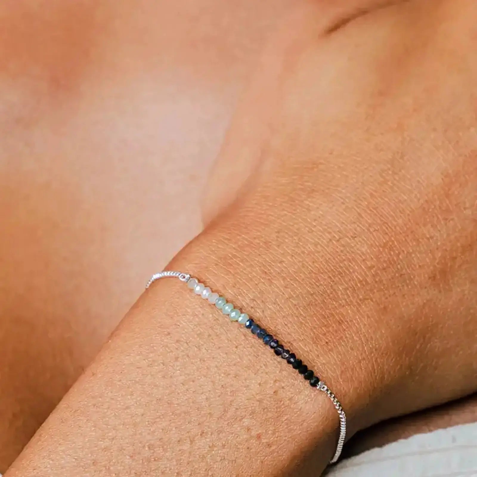 Lotus and Luna "Trust the Universe" Goddess Bracelet, silver adjustable Affirmation Bracelet with Crystals on model