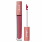 Minori Beauty Vegan Lip Gloss in Juneberry a raspberry mauve color next to the doe-foot applicator wand