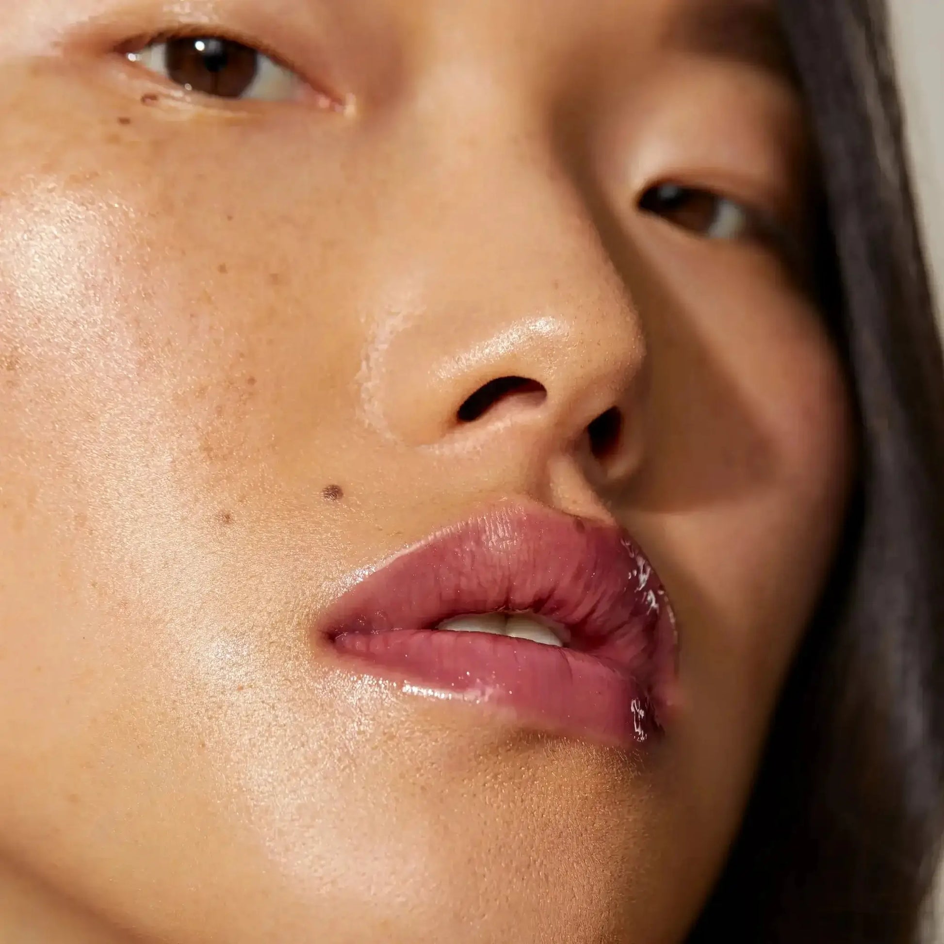 Minori Lip Gloss in Juneberry on Model's Lips