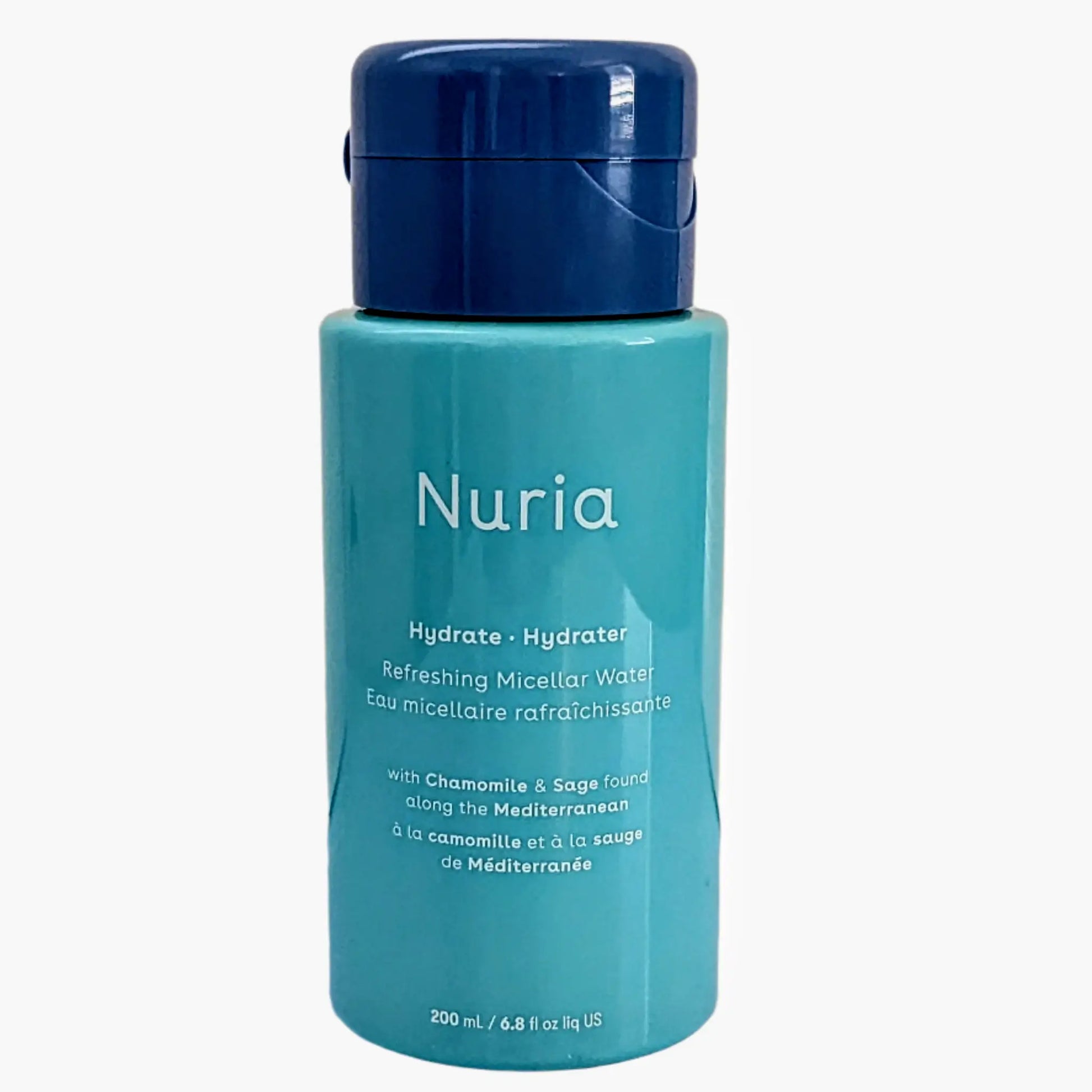 Nuria hydrating micellar water bottle with blue cap on a white background