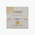 Om Mantra Bracelet - Gemstone Yoga Bracelet with rhodolite, sodalite, and turquoise beads on a pink adjustable cord.