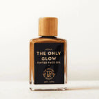 The Only Glow - Hydrating Organic Foundation Serum in a 30ml glass bottle with a wooden cap, offering buildable coverage.