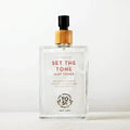The Organic Skin Co. Set The Tone Mist Toner, a Hydrating Rose Toner Mist in a 3.4 oz glass pump bottle on white background.
