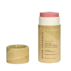 peach blush stick in eco-friendly paper tube with it's cap off showing the natural looking color and vegan cream formula