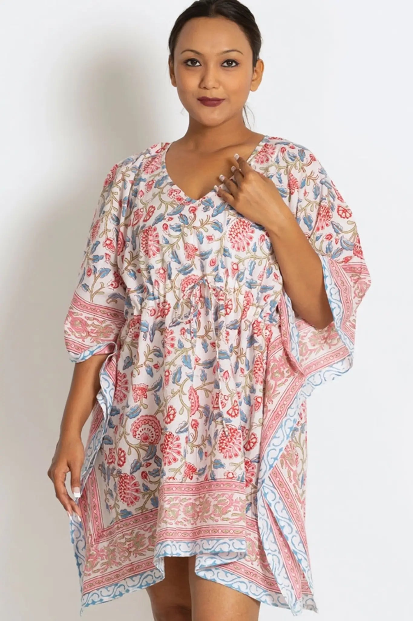 Block Printed Mini Caftan Dress in a Pink and Blue Floral Print. Woman Wearing a Short Caftan Dress.