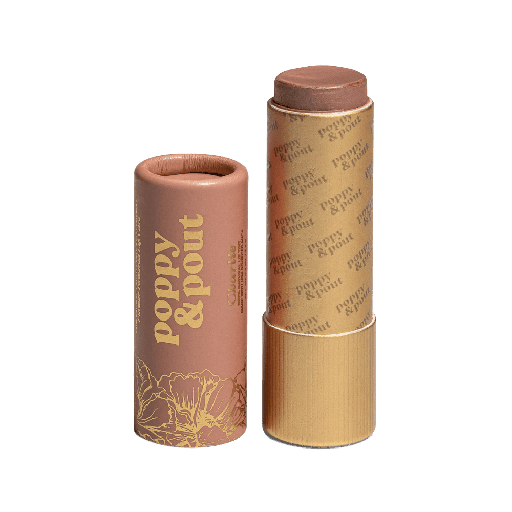 Poppy and Pout Charlie Lip Tint in zero waste cardboard tube showing cool nude lip tint color.
