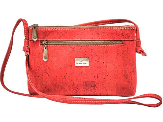Red crossbody bag with gold metal zippers and front pocket