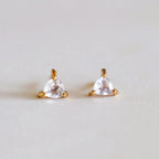 Rose Quartz gemstone earrings featuring triangular pink stones set in 18k yellow gold.