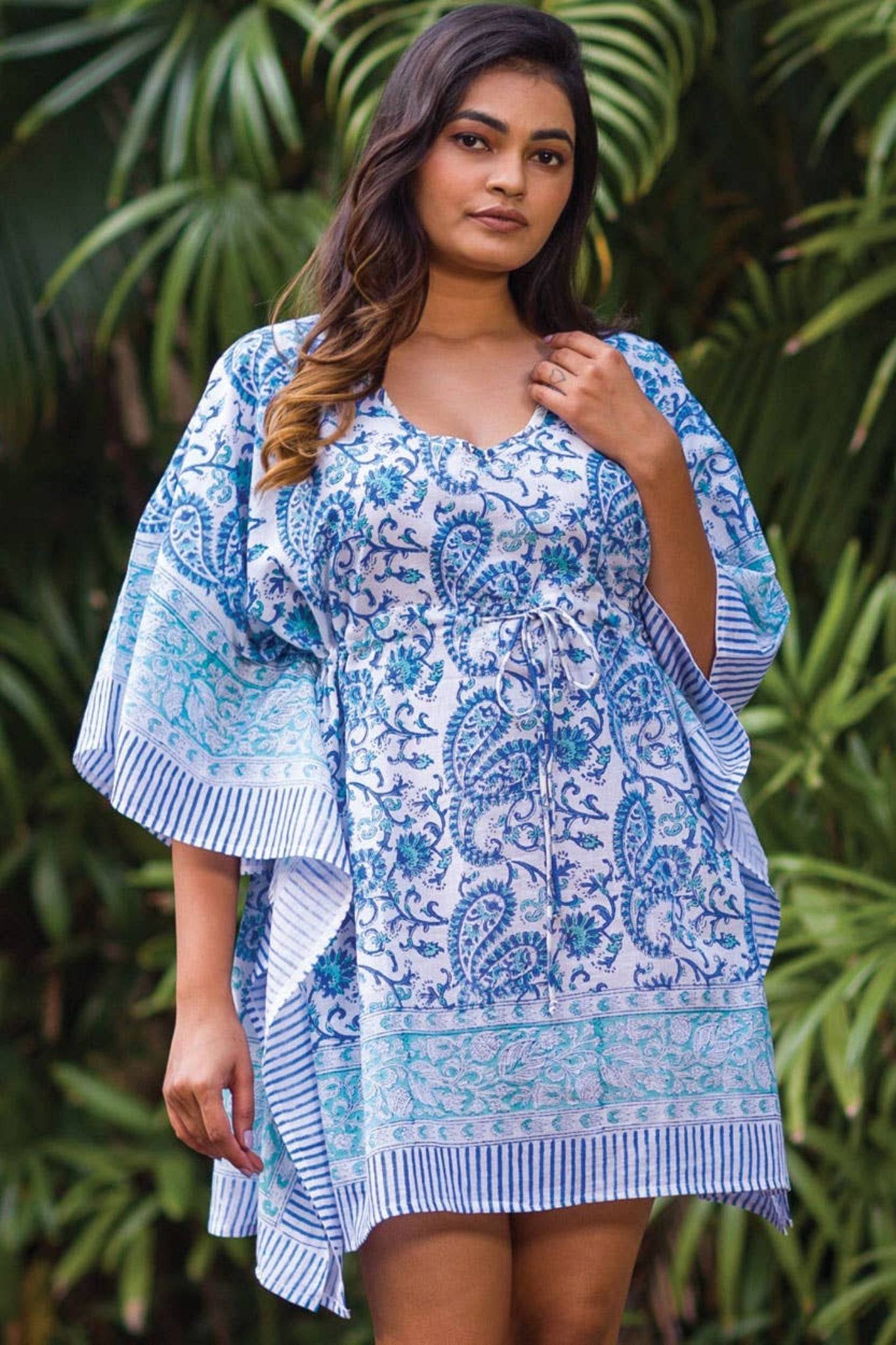 Plus-size model wearing Sky Blue Caftan with turquoise paisley design, showcasing its relaxed fit and bohemian beachwear appeal.