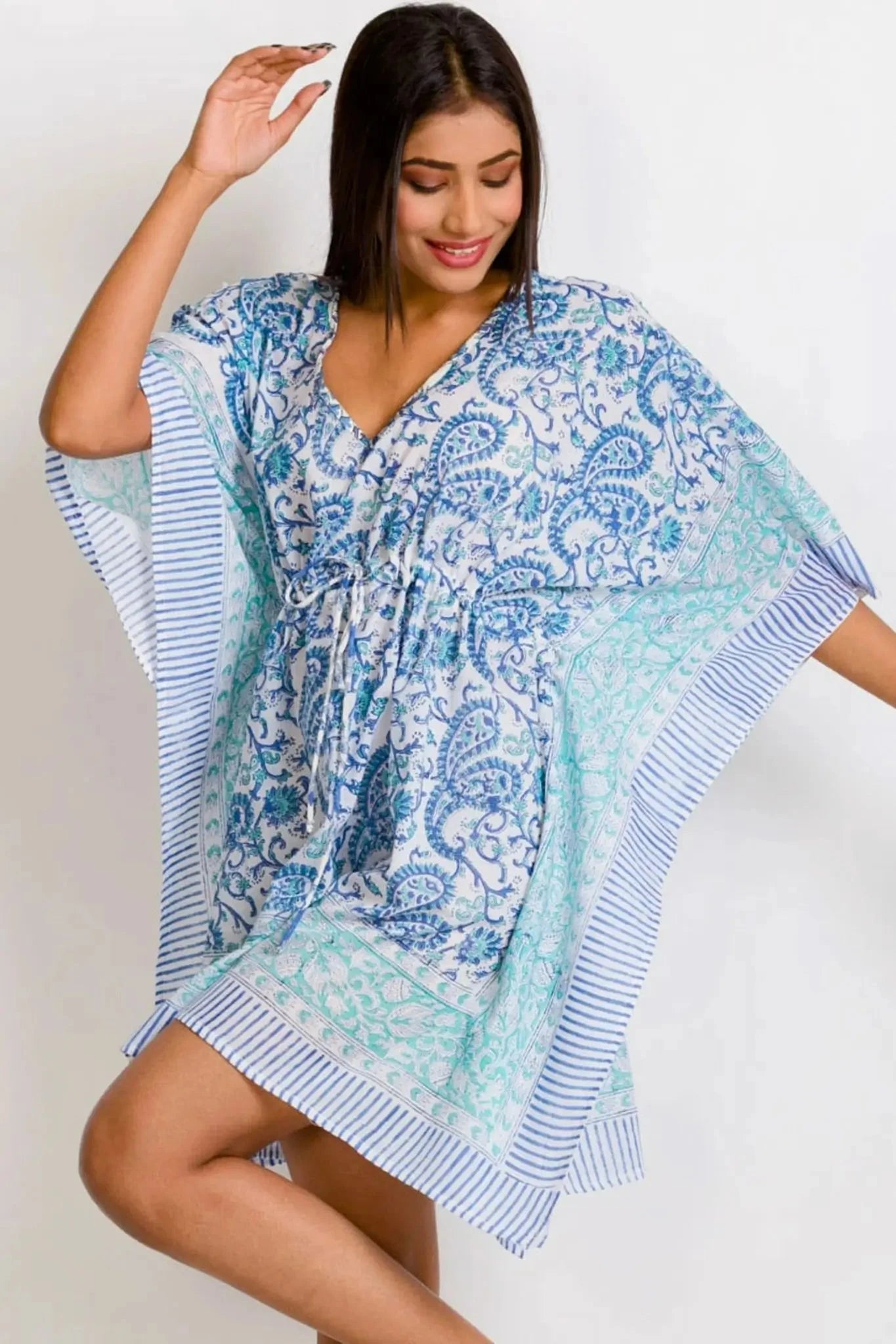 Sky Blue Caftan with turquoise paisley print and drawstring waist, styled as a boho beach cover-up. Lightweight and perfect for summer wear.