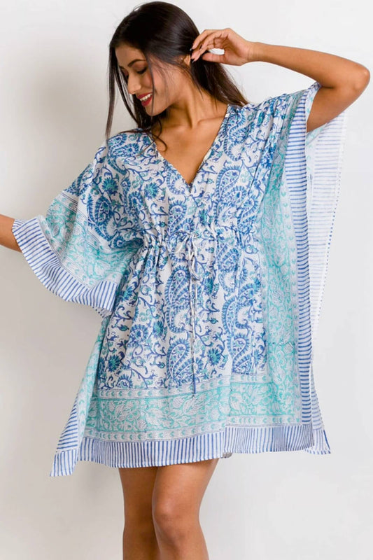 Sky Blue Caftan with turquoise paisley print and drawstring waist, styled as a boho mini dress. Lightweight and perfect for beach cover-up.