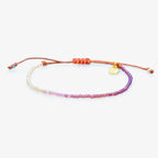 Stay Wild Moon Child Bracelet LotusAndLuna Boho Bead Bracelet with pink, purple and white shimmery beads on a cotton cord