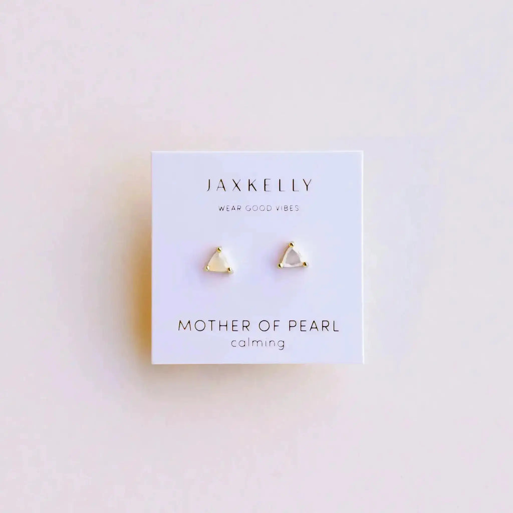 White Mother of Pearl Earrings by JaxKelly featuring minimalist gold triangle stud design. Elegant gemstone earrings for everyday wear or special occasions.