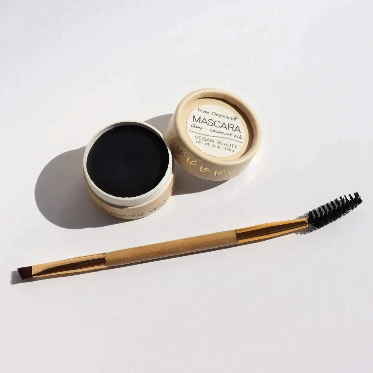 Vegan Black Cake Mascara in an Eco-friendly Paper Pot with a Double ended Bamboo Brush.