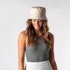 Reversible bucket hat, paisley sun hat shown in khaki, tan and white for beach wear or festival wear by Lotus-and-Luna.