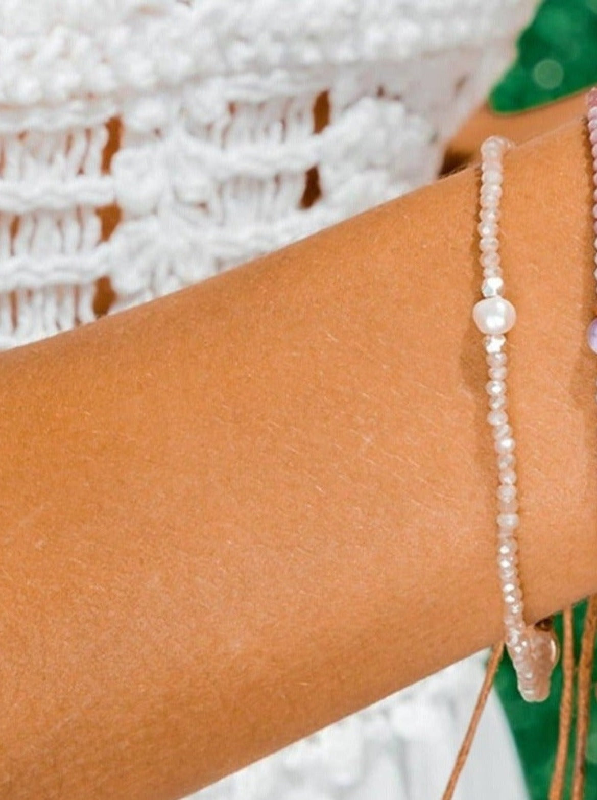 Genuine White Pearl & Crystal Adjustable Pearl Bracelet on model's wrist