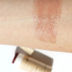 River Organics Fig Lip Stain: Natural Plum Lasting Lip Color, Tinted Lip Stain shown on skin, Clean Beauty at Elle and Willow